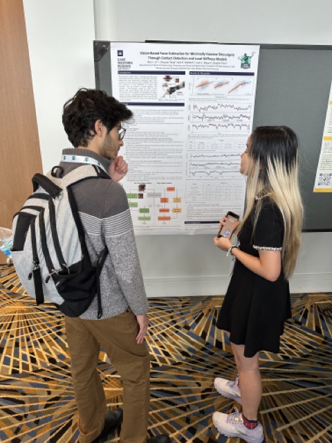 Ray Le presenting her poster